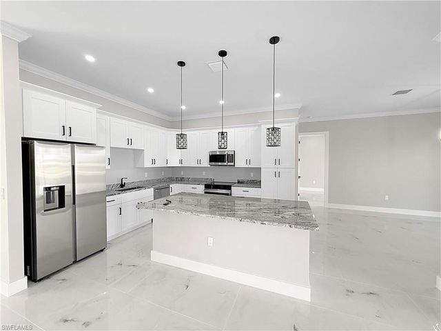 303 NW 26th AVE, Cape Coral, FL 33993