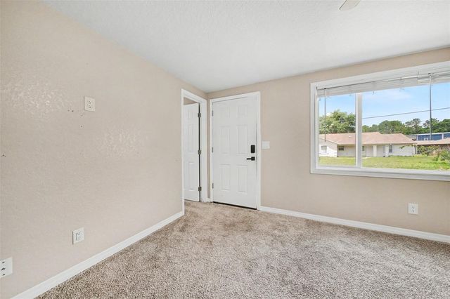 701 E WOODLAND STREET, Bunnell, FL 32110