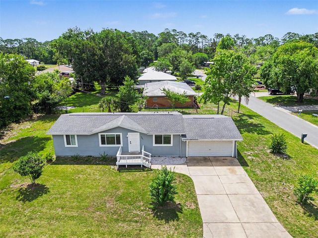 701 E WOODLAND STREET, Bunnell, FL 32110