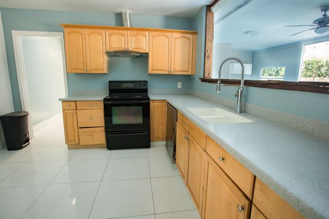 7306 Clarke Road, Lake Clarke Shores, FL 33406
