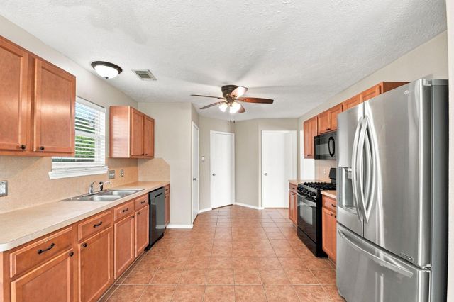 7203 Lazy Summer Court, Magnolia, TX 77354