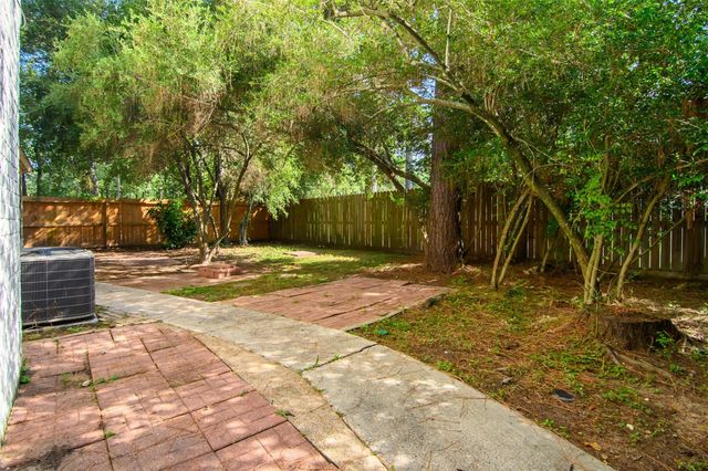 12227 Gun Oak Place, The Woodlands, TX 77380