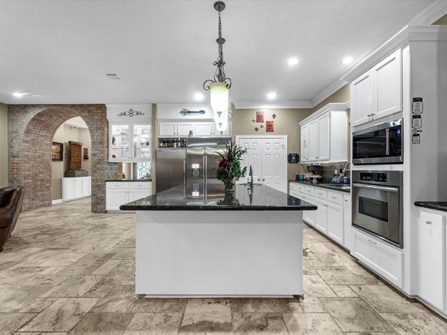 218 Lago Trace Drive, Huffman, TX 77336