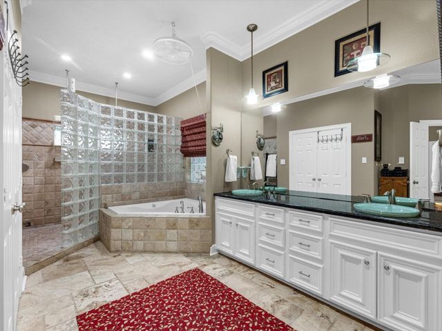 218 Lago Trace Drive, Huffman, TX 77336