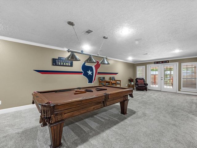 218 Lago Trace Drive, Huffman, TX 77336