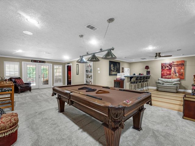 218 Lago Trace Drive, Huffman, TX 77336
