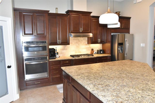 14822 Twin Waters Court, Houston, TX 77044