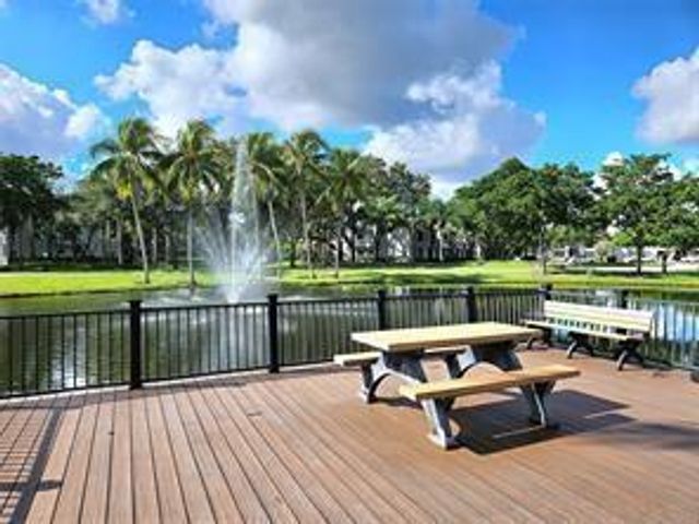 911 Lyons Road 2-207, Coconut Creek, FL 33063