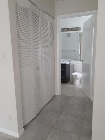 911 Lyons Road 2-207, Coconut Creek, FL 33063