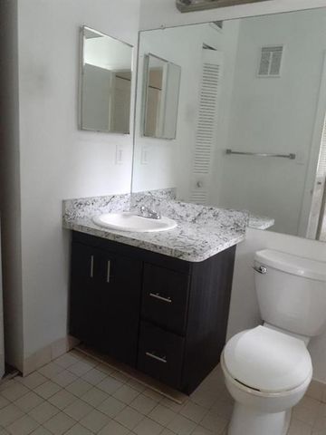 911 Lyons Road 2-207, Coconut Creek, FL 33063