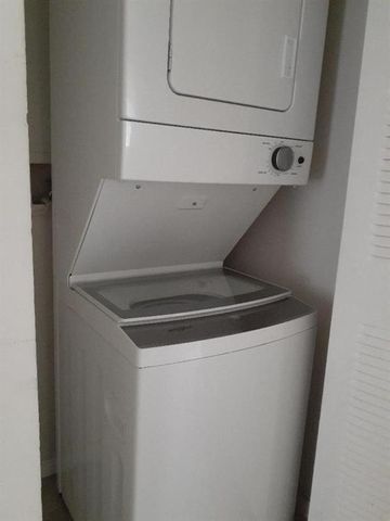 911 Lyons Road 2-207, Coconut Creek, FL 33063