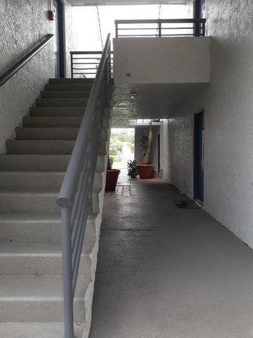 911 Lyons Road 2-207, Coconut Creek, FL 33063