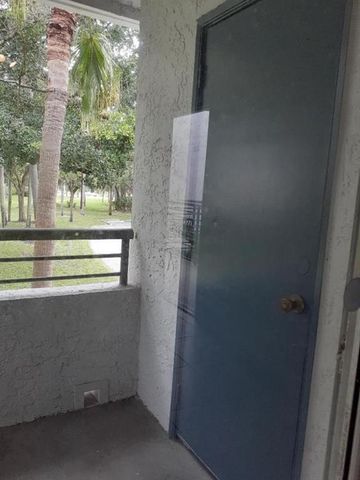 911 Lyons Road 2-207, Coconut Creek, FL 33063