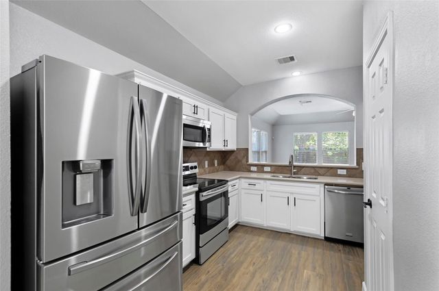 12726 Whistling Springs Drive, Humble, TX 77346