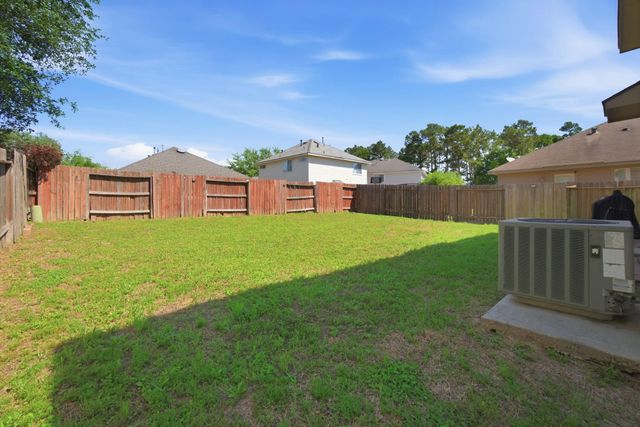 1607 Redbud Grove Court, Conroe, TX 77301