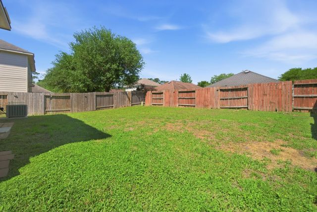1607 Redbud Grove Court, Conroe, TX 77301