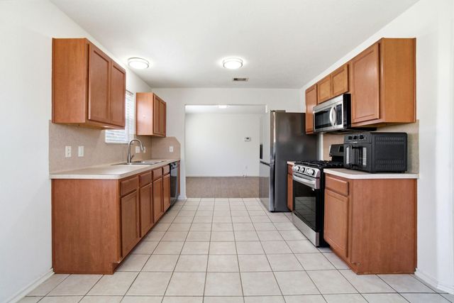 1607 Redbud Grove Court, Conroe, TX 77301