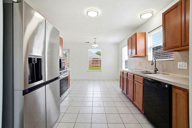 1607 Redbud Grove Court, Conroe, TX 77301