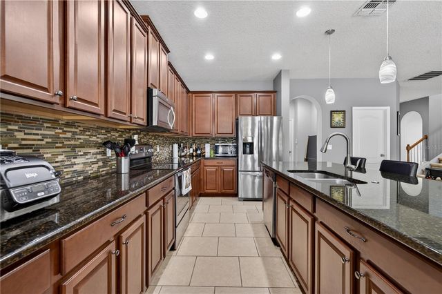 736 WOODS LANDING DRIVE, Minneola, FL 34715