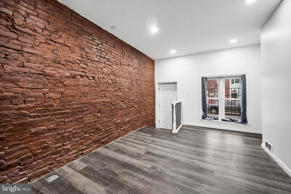 Image 2 of property listing at 2011 N PULASKI ST, Baltimore, MD 21217