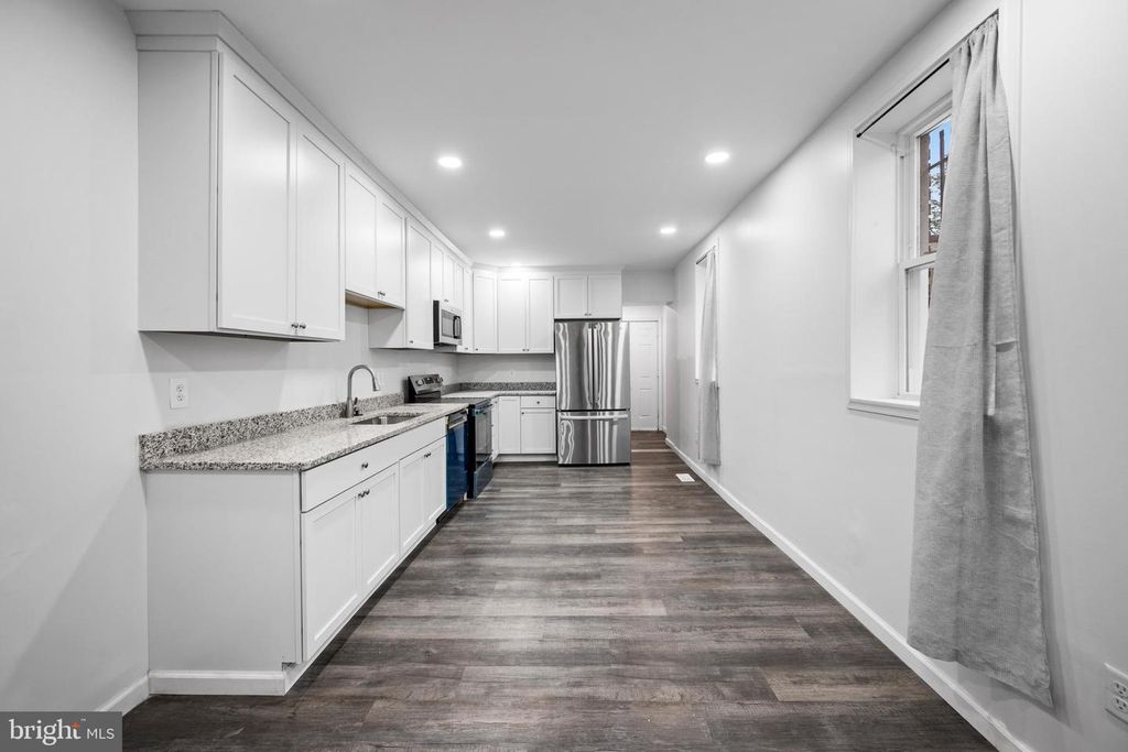 Image 4 of property listing at 2011 N PULASKI ST, Baltimore, MD 21217