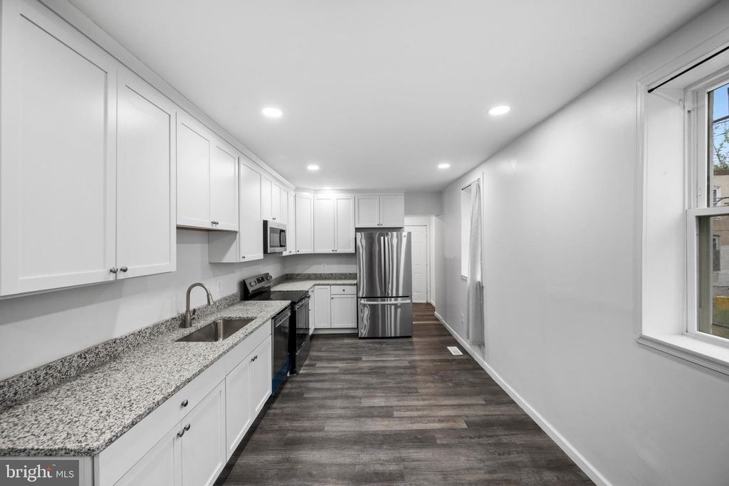 Image 7 of property listing at 2011 N PULASKI ST, Baltimore, MD 21217