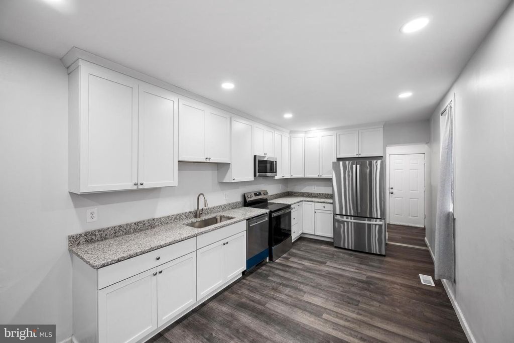 Image 8 of property listing at 2011 N PULASKI ST, Baltimore, MD 21217