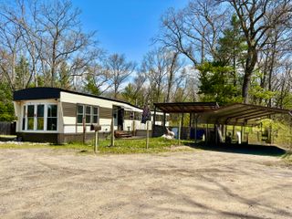 7920 E Lake Road, Holton Twp, MI 49457