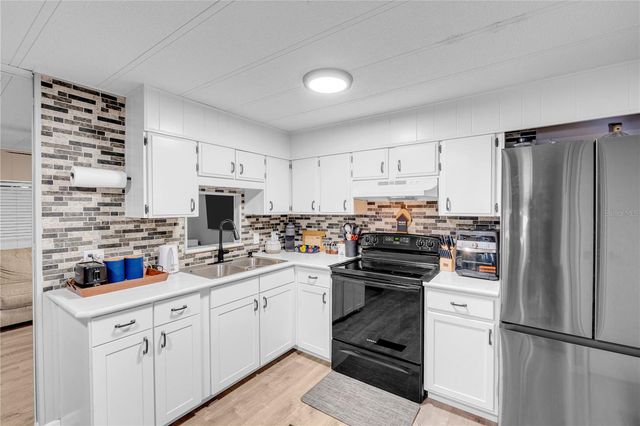 34127 WASHINGTON AVENUE, Leesburg, FL 34788