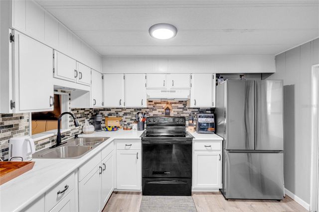 34127 WASHINGTON AVENUE, Leesburg, FL 34788