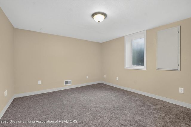 15157 Pinehurst Drive, Lansing, MI 48906