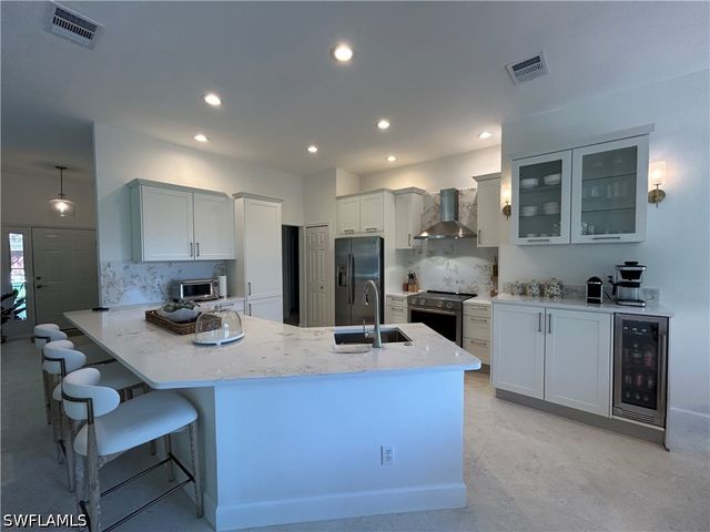 6703 Old Banyan WAY, Naples, FL 34109