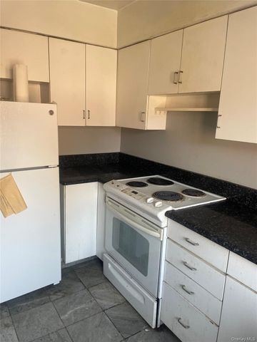 84-21 126th Street, Kew Gardens, NY 11415