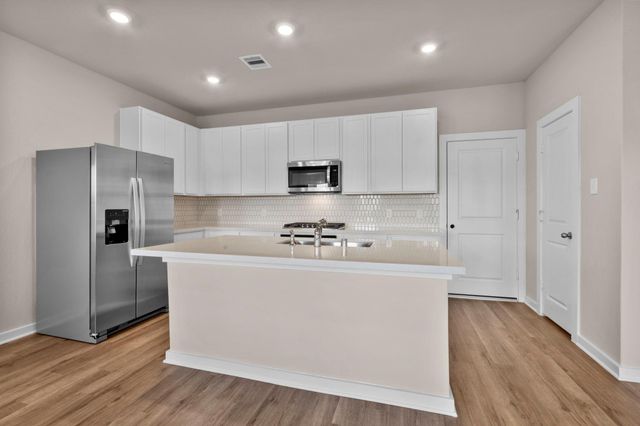 231 Magnolia Laurel Drive, Alvin, TX 77511