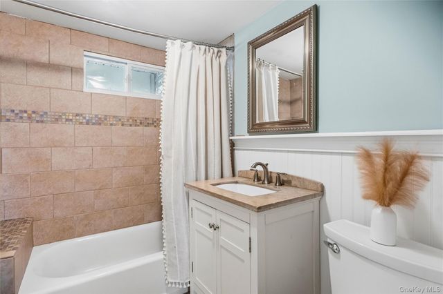 9 Lagoon Boulevard, Massapequa, NY 11758