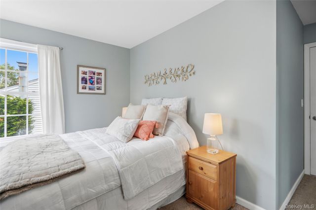 9 Lagoon Boulevard, Massapequa, NY 11758