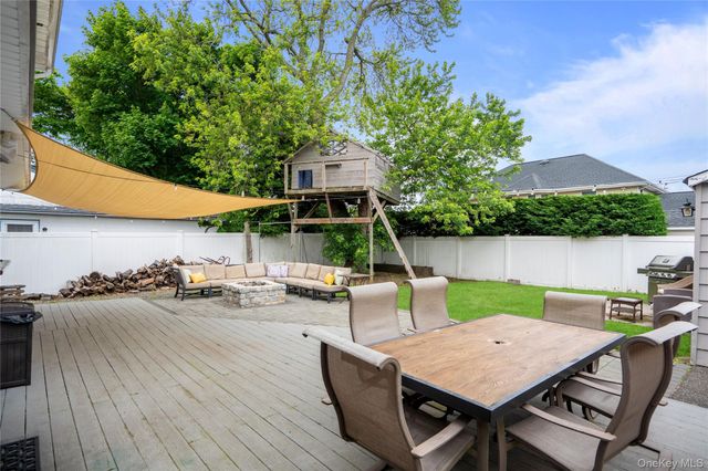 9 Lagoon Boulevard, Massapequa, NY 11758