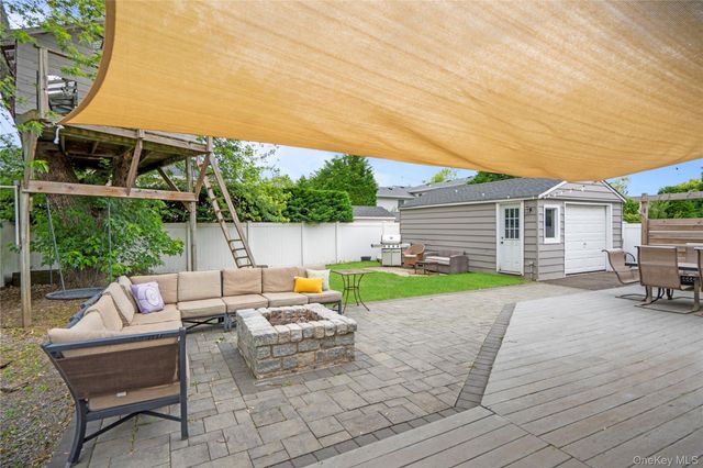 9 Lagoon Boulevard, Massapequa, NY 11758