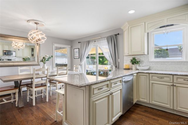 9 Lagoon Boulevard, Massapequa, NY 11758