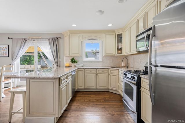 9 Lagoon Boulevard, Massapequa, NY 11758