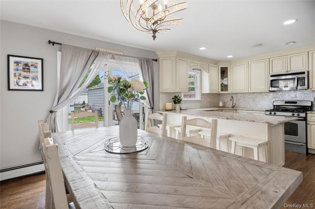9 Lagoon Boulevard, Massapequa, NY 11758