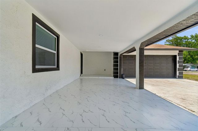7906 N FREMONT AVENUE, Tampa, FL 33604