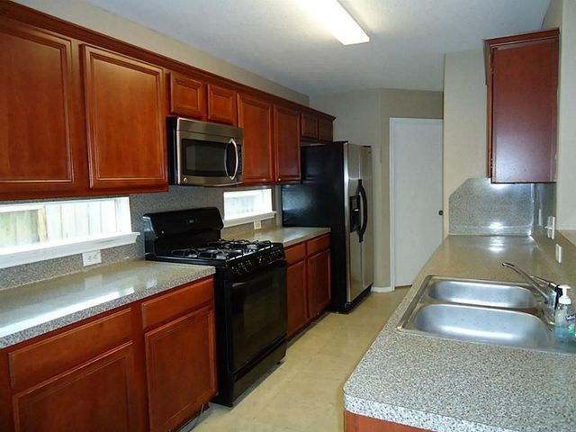 11047 Knobbley Oak Court, Houston, TX 77065