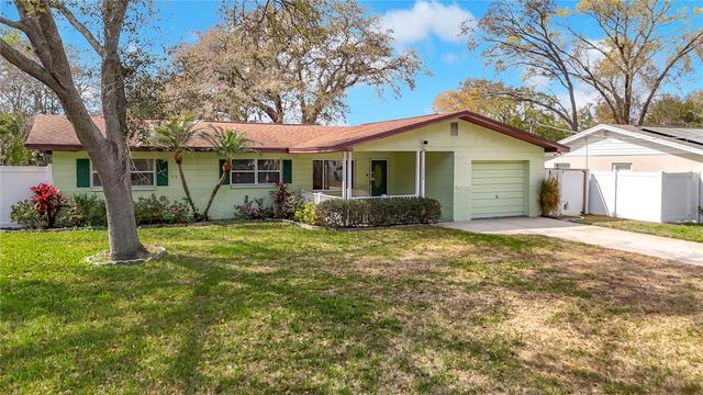 11328 N OAKLEAF AVENUE, Tampa, FL 33612