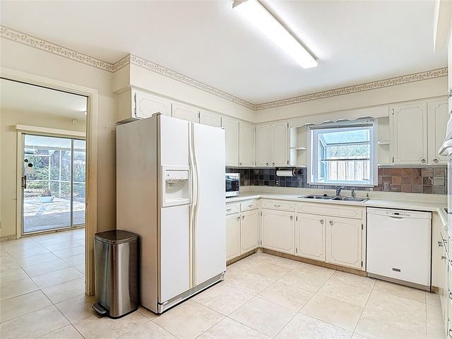 11328 N OAKLEAF AVENUE, Tampa, FL 33612