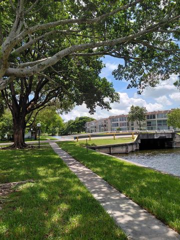 8350 SANDS POINT Boulevard 102E, Tamarac, FL 33321