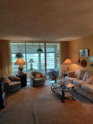 8350 SANDS POINT Boulevard 102E, Tamarac, FL 33321