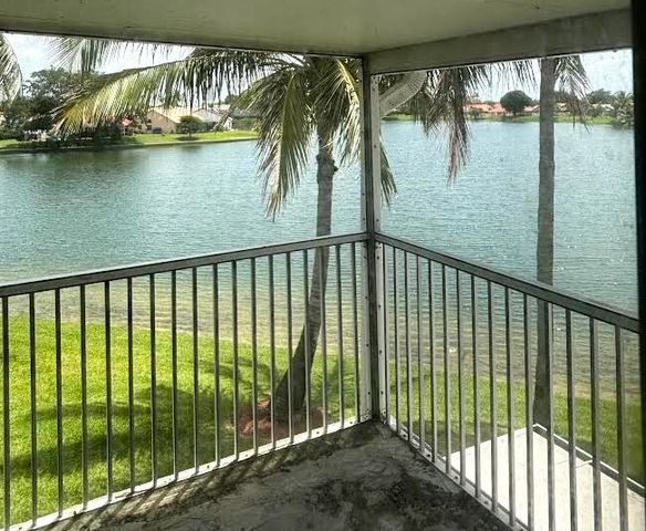 7780 STONE HARBOUR Drive 4, Lake Worth, FL 33467
