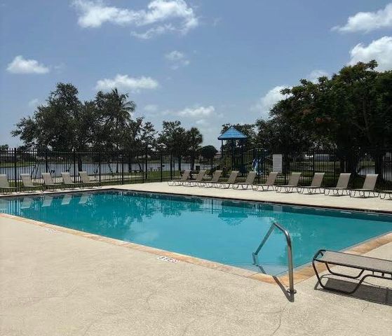 7780 STONE HARBOUR Drive 4, Lake Worth, FL 33467