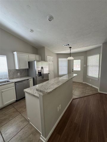 6 Tranquil Glade Place, Spring, TX 77381